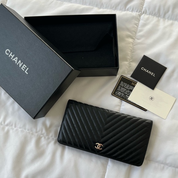 CHANEL Handbags - SOLD Chanel Black Chevron Calf Bifold
